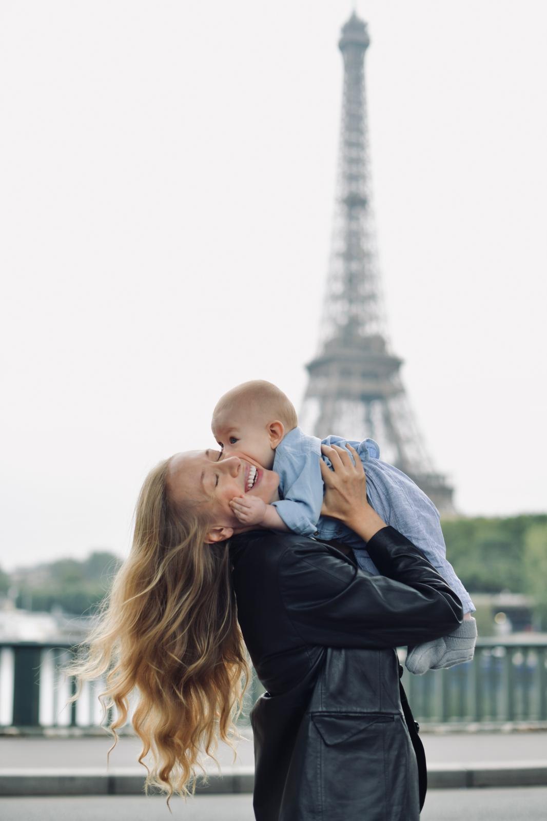 Charlene Rennit with Rumi in Paris near the Eiffel Tower